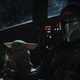 The Child and Pedro Pascal in “The Mandalorian.”